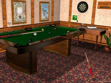 A billiards table with balls and cues, positioned in a furnished room with framed art, a dartboard, and a sign indicating the toilet on the wall.